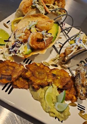 A picture of My Salt and Pepper Shrimp Taco with Tostones and Garlic Aioli.