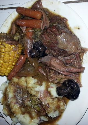 A picture of pot roast & homemade mashed potatoes.