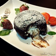 A picture of Molten Marshmallow-Chocolate Cakes.
