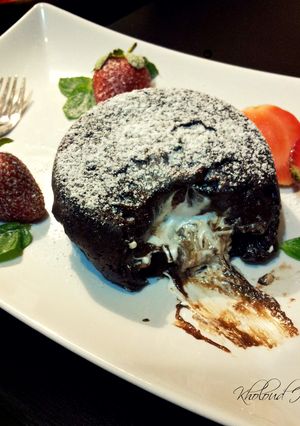 A picture of Molten Marshmallow-Chocolate Cakes.