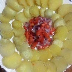A picture of Sweet potatoes serves with kachumbari.