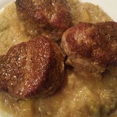 A picture of Pork Medallions w/ Curry-Banana Sauce.