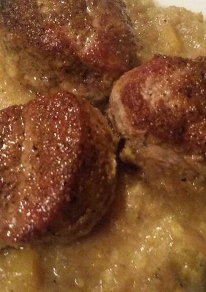 A picture of Pork Medallions w/ Curry-Banana Sauce.