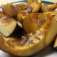 A picture of Ree Drummond's Sweet Roasted Rosemary Acorn Squash Wedges.