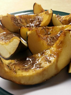 A picture of Ree Drummond's Sweet Roasted Rosemary Acorn Squash Wedges.