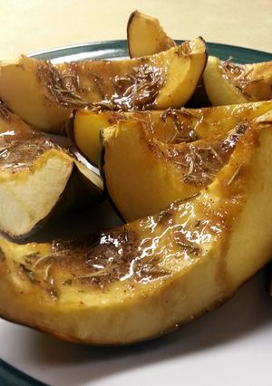 A picture of Ree Drummond's Sweet Roasted Rosemary Acorn Squash Wedges.