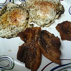 A picture of Pork belly and eggs.