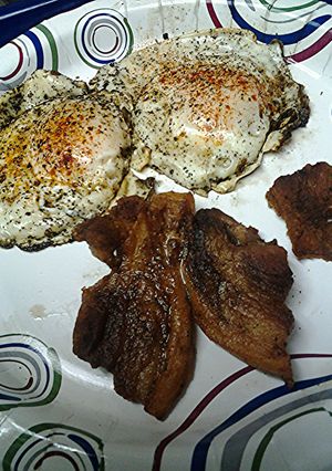 A picture of Pork belly and eggs.