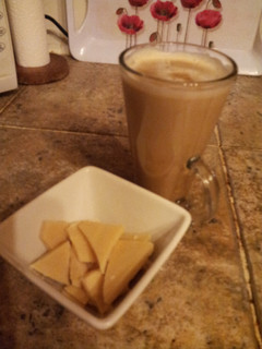 A picture of A 'latte' the old fashioned way with smooth caramel sauce and hand made white chocolate chunks.