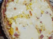 Una foto de tarta pollo queso