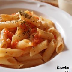 A picture of Penne Arrabbiata with Fresh Tomatoes.