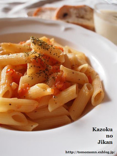 A picture of Penne Arrabbiata with Fresh Tomatoes.