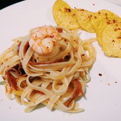 A picture of Fettucini Aglio Olio.