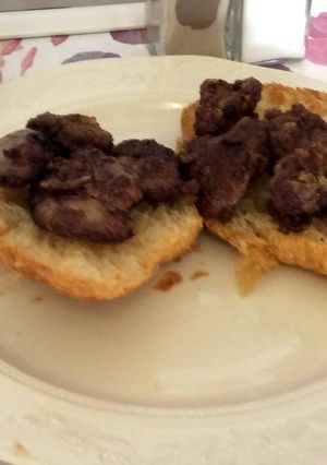 A picture of Chicken Livers with Peri Peri and Tomato sauce.