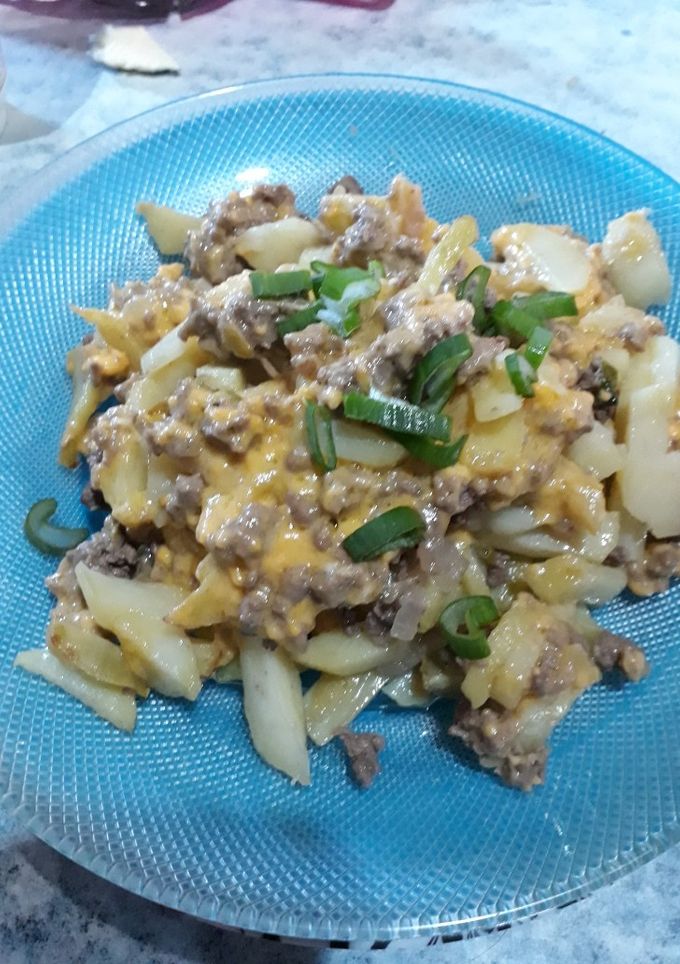 Una foto de Papas chili