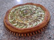 Une photo de tarte courgettes moutarde