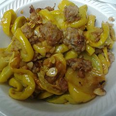 A picture of Squash with sausage.