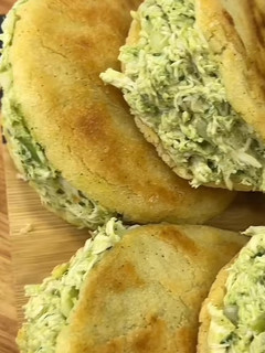 A picture of Arepa with Avocado Chicken.