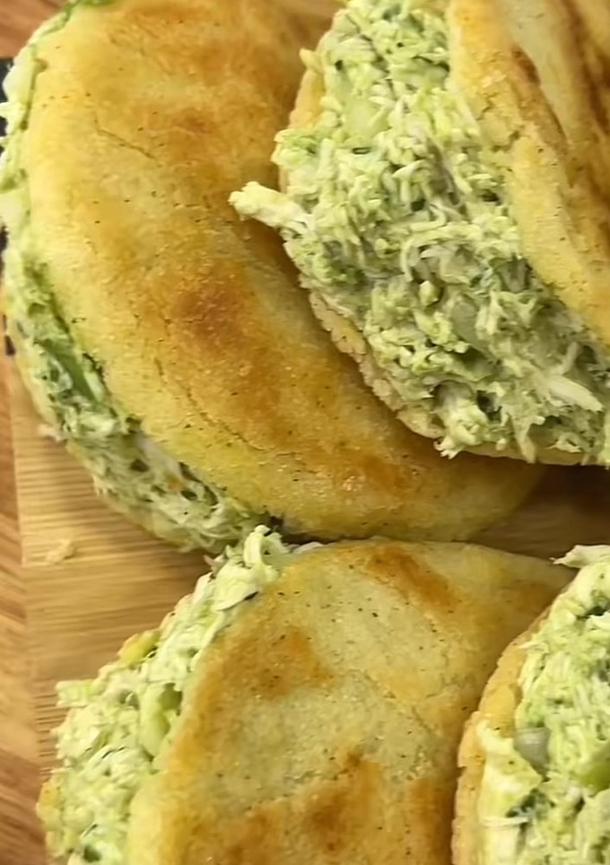 A picture of Arepa with Avocado Chicken.