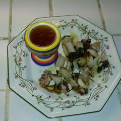 A picture of Fried Squid with Ginger Soy Sauce.