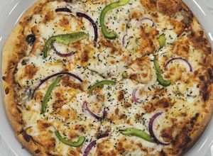Foto de Pizza caseira de frango