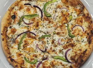 Foto de Pizza caseira de frango