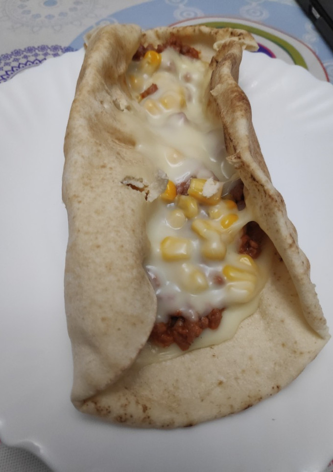 Una foto de Rollito carne y queso