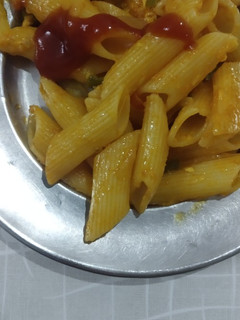 A picture of Red sauce pasta.
