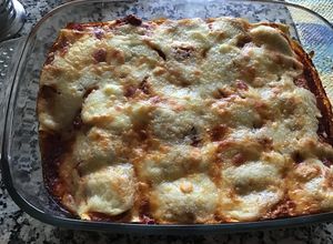 Una foto de Canelones rellenos rellenos de requesón y espinacas
