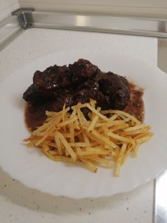 Una foto de Carrillada al vino tinto