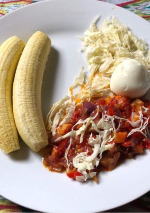 A picture of Unripe plantain with sauce.