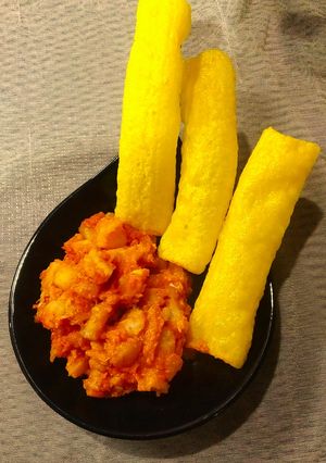 A picture of Garlic potatoes with finger fryums(bhungda bateka).