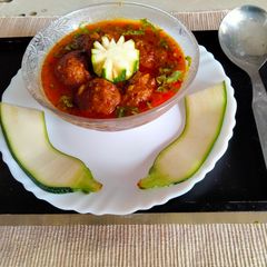 A picture of Zucchini ka kofta ki sabzi.