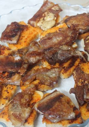 A picture of Ciabatta Toasts with Bacon.