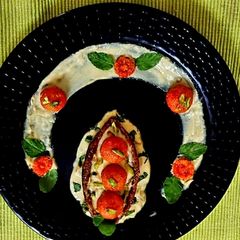 A picture of Dates Boat With Papaya Halwa and Pineapple Yoghurt.