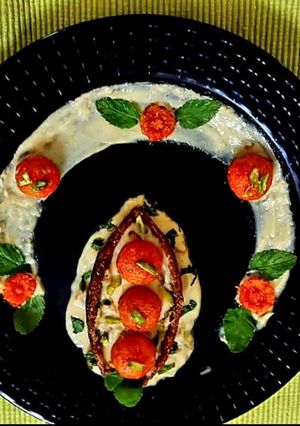 A picture of Dates Boat With Papaya Halwa and Pineapple Yoghurt.