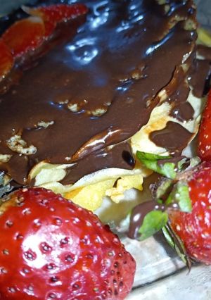 A picture of Pancake strawberry and chocolate ❤️.