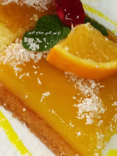 صورة لوصفة بسبوسة بكريمة البرتقال
