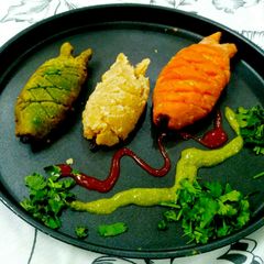 A picture of Tricolour Fish Samosa.