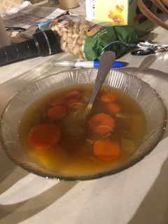 A picture of Carrot leek soup with rice noodles.