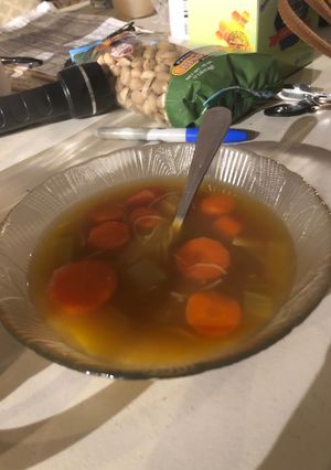 A picture of Carrot leek soup with rice noodles.