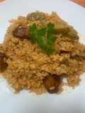 Arroz con secreto y alcachofas