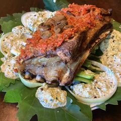 A picture of California Farm Tomato Crusted Lamb Ribs.