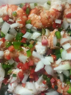 Una foto de Langostinos en salsa criolla!