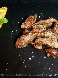 Una foto de Pluma Ibérica Macerada en Hierbas Provenzales