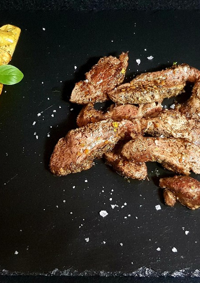 Una foto de Pluma Ibérica Macerada en Hierbas Provenzales
