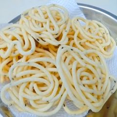 Thengaipal Murukku Coconut Milk Chakli A picture of Thengaipal Murukku Coconut Milk Chakli.