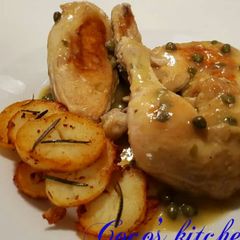 A picture of Pan fried sautee potatoes,Roasted Chicken with capers sauce.
