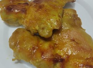 Una foto de Contramuslos🍗de pollo a la naranja🍊🧄🍯
