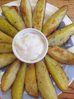 Una foto de Papas rústicas a la pimienta